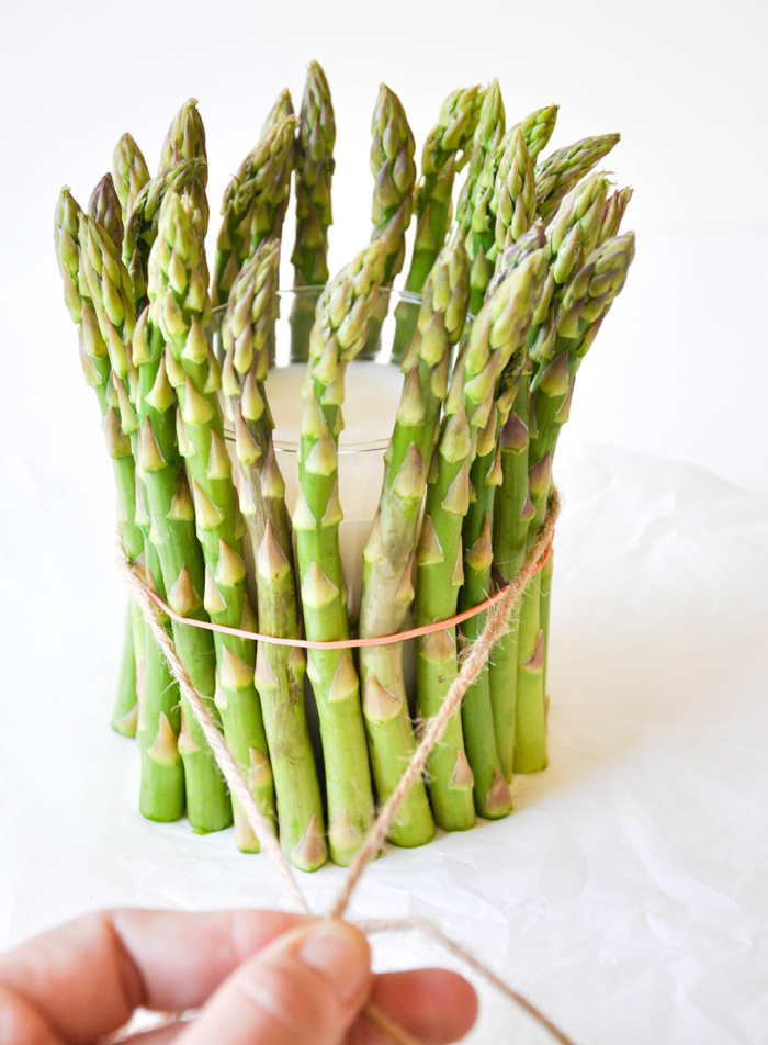 Asparagus Candles :: Add fresh asparagus around a cylinder shaped candle and instant springtime happiness