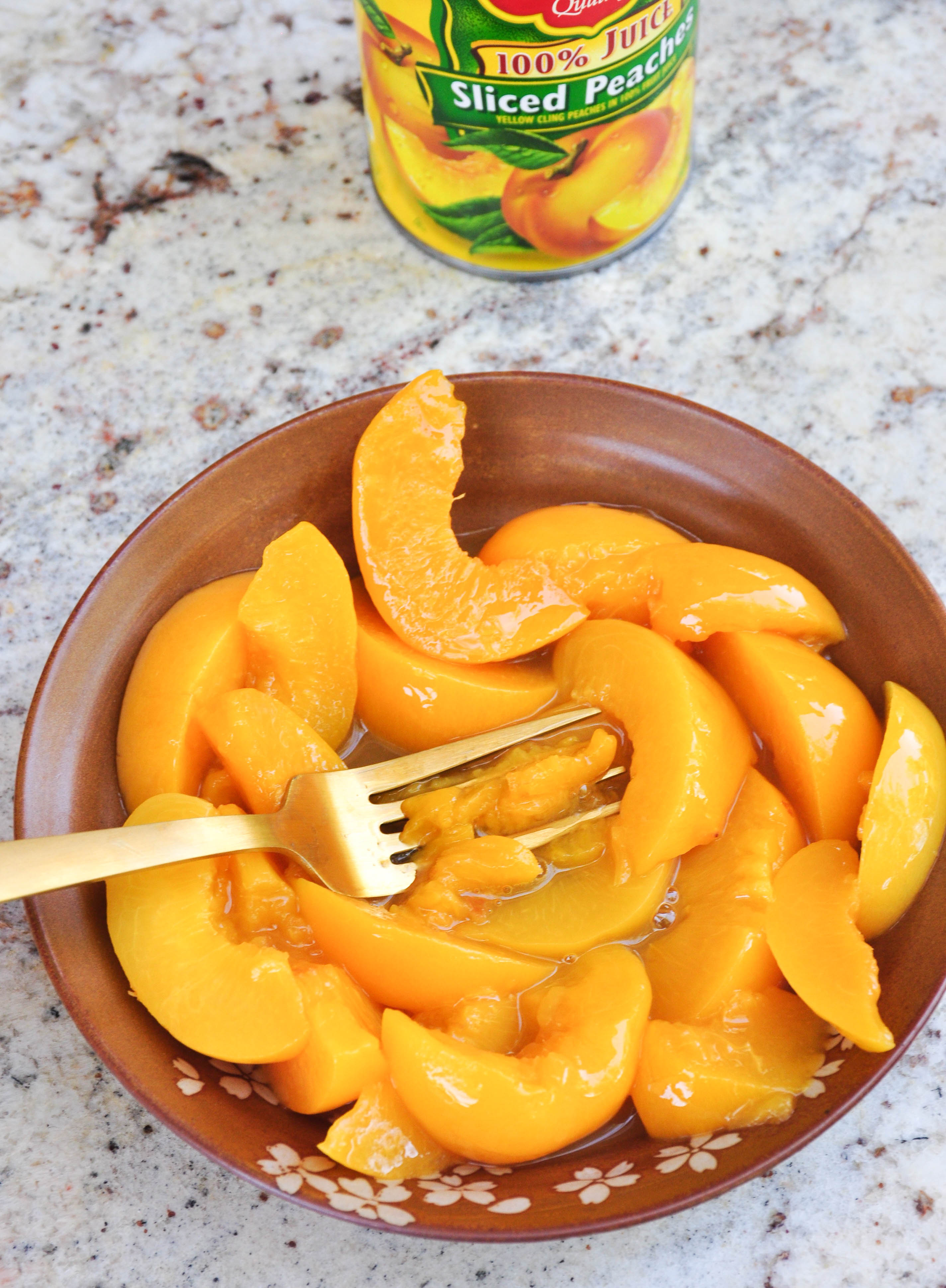 Canned Peach Ice Cream atop Fresh Grilled Peaches