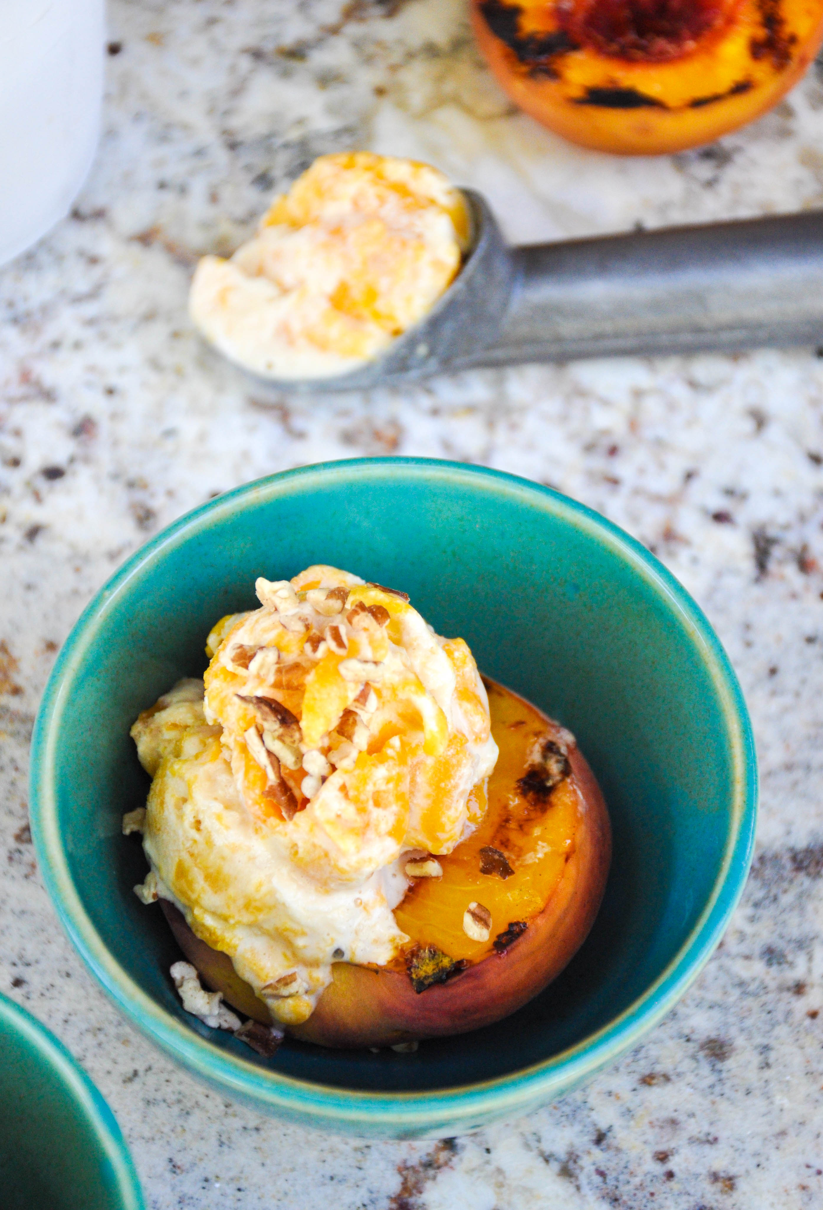 Canned Peach Ice Cream atop Fresh Grilled Peaches